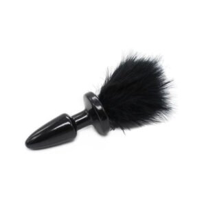 Dettaglio del design con coda pon pon del plug anale